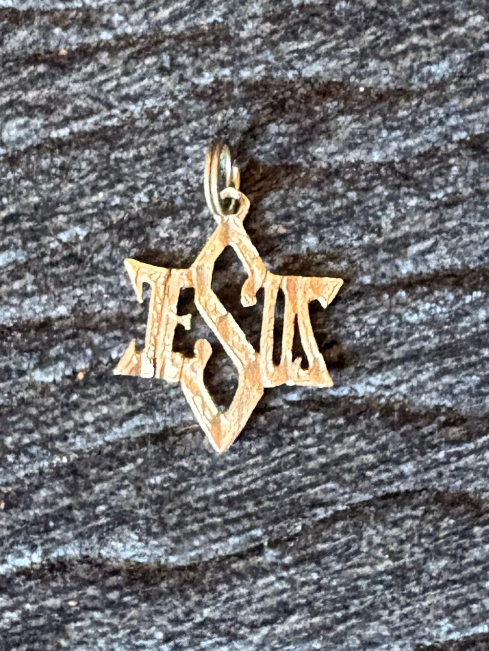Sterling Silver Star of David
lettering that spells "Jesus